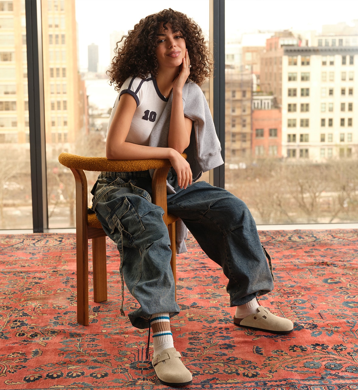 woman wearing Birkenstock boston clogs