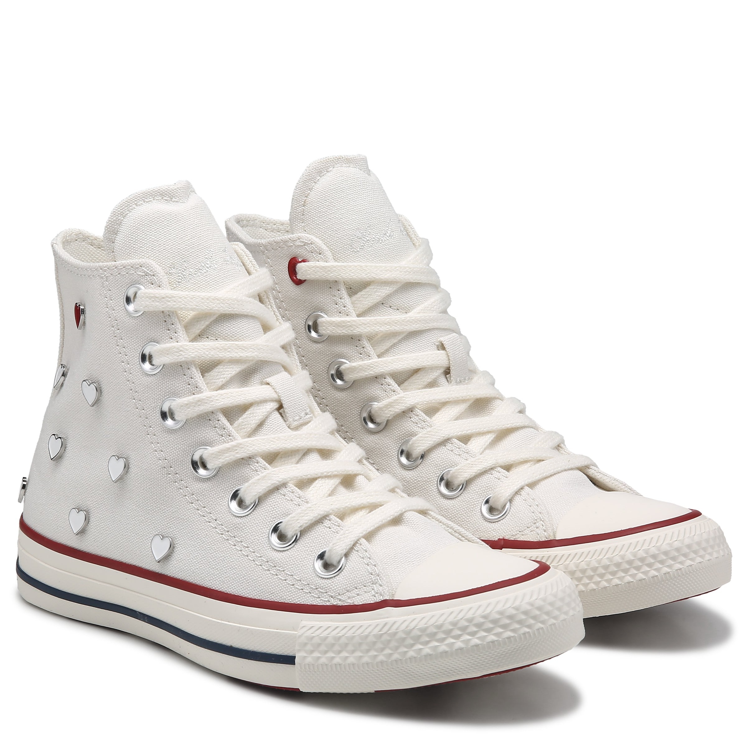 cream embellished Converse sneakers