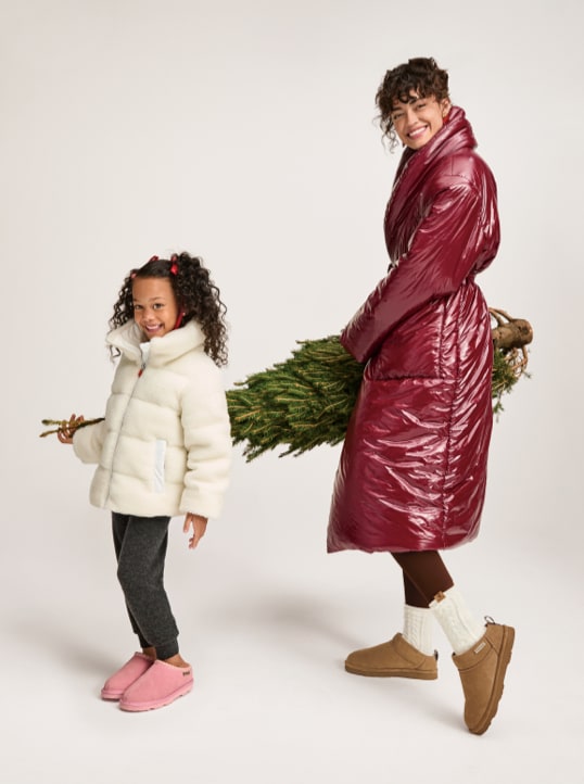 women and girl wearing Bearpaw cozy boots