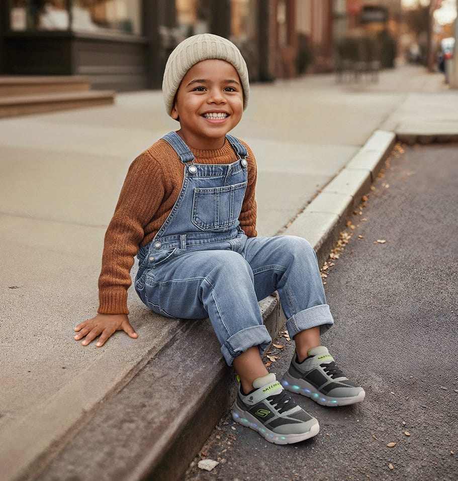 kid wearing Skechers Glide-step sneakers