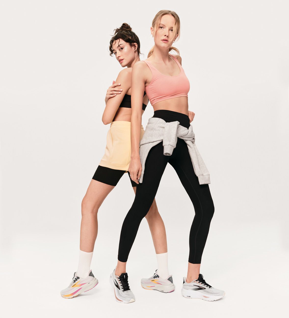 women wearing performance running sneakers