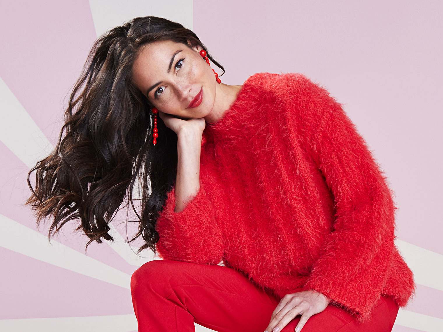 woman wearing a red sweater