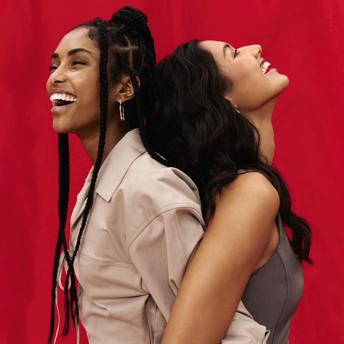two women laughing and smiling
